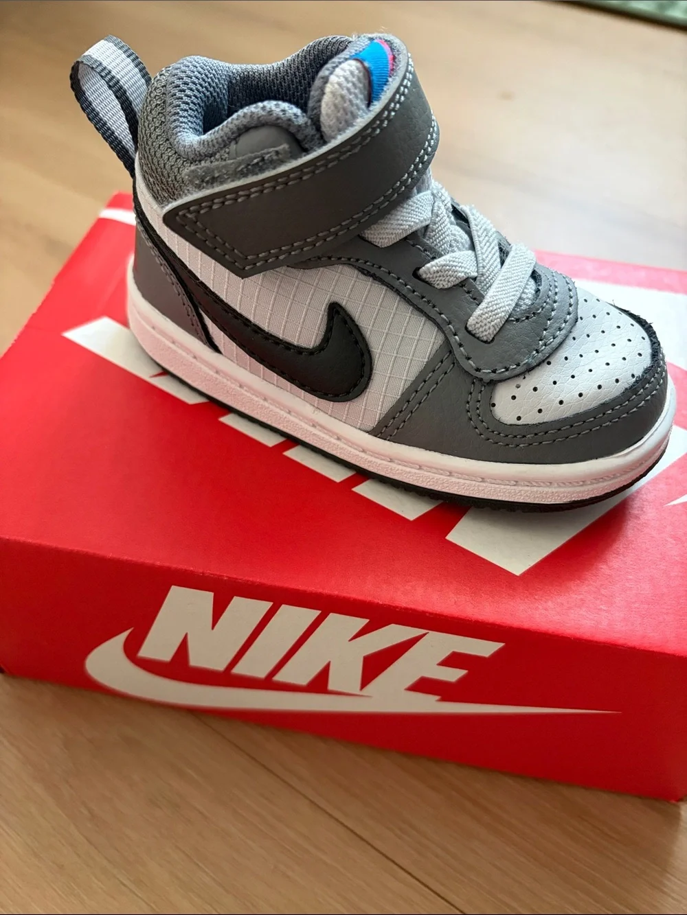 Nike Air Max Toddler Gray and White Mid-Top Sneaker with Black Swoosh